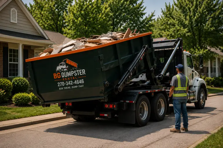 Home 5 Roll-off dumpster being delivered to a residential driveway in Bowling Green, KY